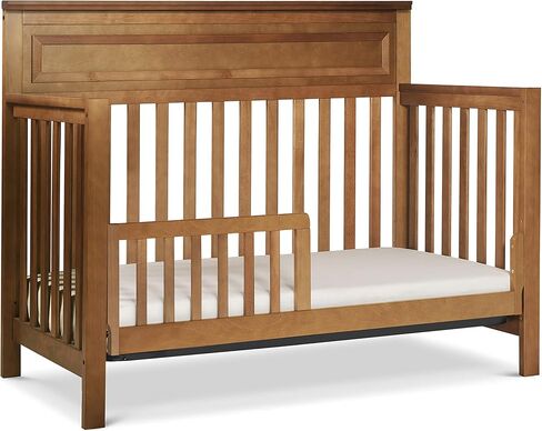 daVinci Autumn 4-in-1 Baby Crib Convertible to Toddler Bed, Daybed, Full-Size Bed - Easy Assembly - GREENGUARD Certified - 4 Adjustable Mattress Heights - Conversion Kit Sold Separately, Chestnut in Kuwait