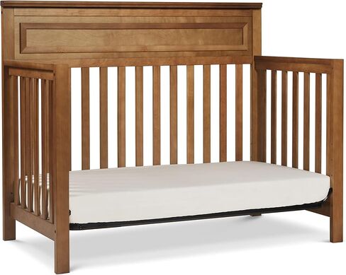 daVinci Autumn 4-in-1 Baby Crib Convertible to Toddler Bed, Daybed, Full-Size Bed - Easy Assembly - GREENGUARD Certified - 4 Adjustable Mattress Heights - Conversion Kit Sold Separately, Chestnut in Kuwait