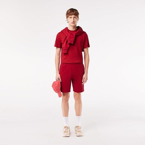 تي شيرت Lacoste بمقاس عادي وأكمام قصيرة ورقبة دائرية مع رسمة تمساح صغيرة على الجزء الأمامي من الصدر in Saudi Arabia
