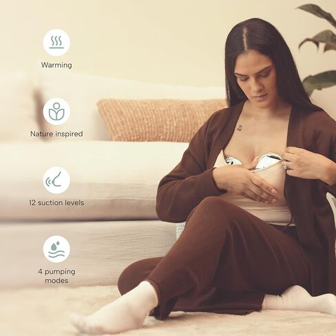 مضخة الثدي Zomee Mother's Nature W1 يمكن ارتداؤها، بدون استخدام اليدين ومن فئة المستشفى، 12 مستوى شفط، 4 أوضاع، تقنية التدفئة، تحاكي إيقاع الطفل، تصميم محمول هادئ، خالية من مادة BPA، ضمان لمدة عامين in Kuwait