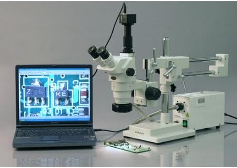 AmScope ZM-4TV3 مجهر تكبير ستيريو ثلاثي العينيات احترافي، عدسات EW10x وEW20x، تكبير 2X-180X، هدف تكبير 0.67X-4.5X، إضاءة محيطة، حامل ذراع مزدوج، يتضمن عدسات بارلو 0.3x و2.0x in Kuwait