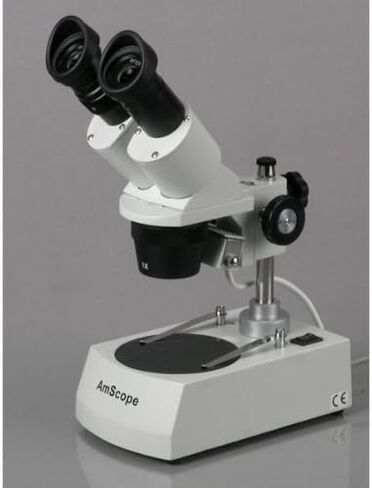 AmScope SE306R-P-E مجهر ستيريو رقمي مثبت للأمام، عدسات WF10x، تكبير 20X و40X، أهداف 2X و4X، إضاءة هالوجين علوية وسفلية، لوحة مسرح سوداء/بيضاء قابلة للعكس، حامل عمود، 120 فولت، يتضمن كاميرا 0.3 ميجابكسل وS in Kuwait