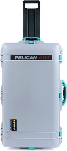 حافظة Air Pelican 1615 باللون الفضي مع مقابض ومزالج باللون الأزرق المخضر. تأتي فارغة ومع عجلات. in Kuwait