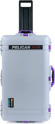 حافظة Air Pelican 1615 فضية بمقابض ومزالج أرجوانية. تأتي فارغة ومع عجلات. in Kuwait