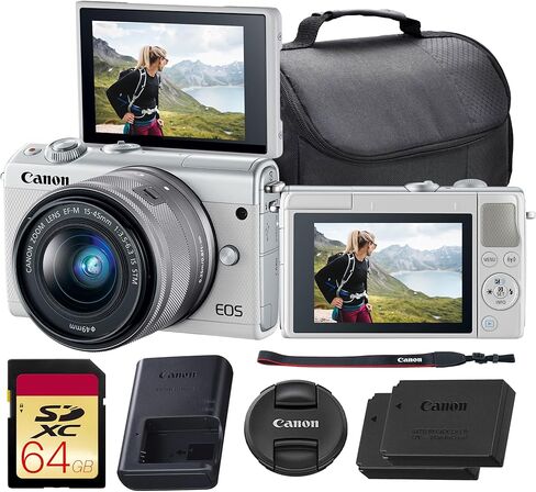كاميرا كانون EOS M100 بدون مرآة مع عدسة 15-45 ملم (أبيض) | مستشعر APS-C بدقة 24.2 ميجابكسل، Dual Pixel CMOS AF، واي فاي وبلوتوث | رائعة للاستخدام في السفر والصور المبتدئة (2210C011) + بطاقة سعة 64 جيجابايت + حقيبة + بطارية in Kuwait
