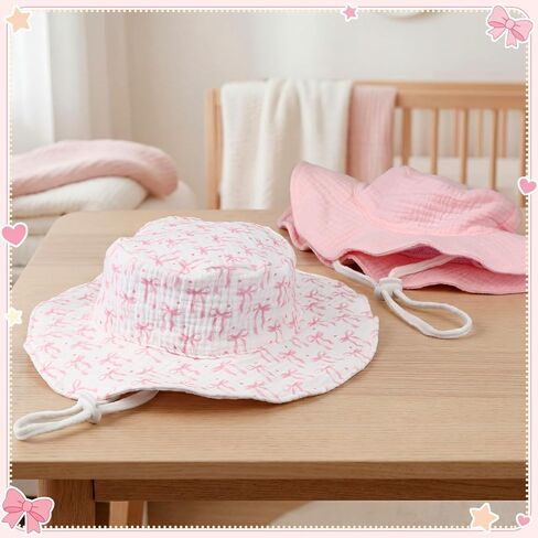 Cuffbow 2 Pack Pink Bow Muslin Infant Sun Hat UPF 50+ حماية من الشمس Coquette قبعة دلو الطفل مع حافة واسعة لحديثي الولادة للصيف للبنين والبنات in Kuwait