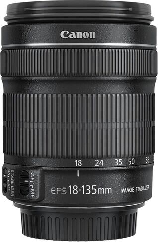 Canon EF-S 18-135mm f/3.5-5.6 هي عدسة STM في صندوق أبيض، مع ضمان Canon USA لمدة عام in Kuwait
