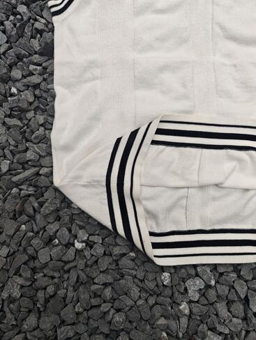 Men's Striped Cable Knit Sweater Vest V Neck Sleeveless Casual School Sweater Tops in Saudi Arabia
