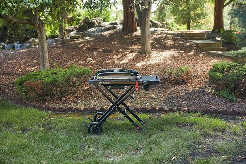 Weber Traveler® Portable Gas Grill (Liquid Propane) for Outdoor Cooking – Black, Porcelain-Enameled Lid, Side Table, Folding Portable Grill with Wheels for Camping, Tailgating & Travel in Kuwait