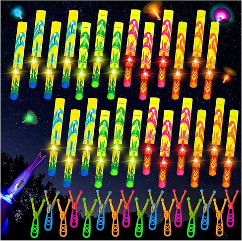 Ynybusi 50 Pcs Slingshot Outdoor Toys,Glow in The Dark Party Favor Toys Rocket with Launcher,LED Light Up Helicopter Toys,Glow Sticks Birthday Christmas Gifts Party Favors for Kids 4-8-12 Bulk Toys in Saudi Arabia