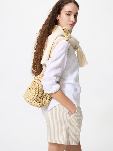 Uniqlo Crochet Drawstring Bag in Saudi Arabia