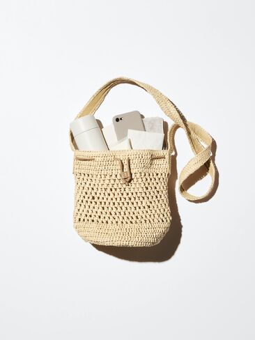 Uniqlo Crochet Drawstring Bag in Saudi Arabia
