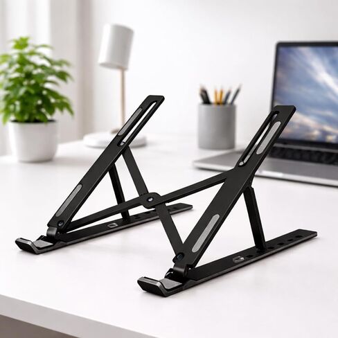 Portable Foldable Laptop Stand for Travel, ABS + Silicone Adjustable Height Laptop Stand Riser for Desk, Ergonomic Pedestal Stand for Computers and Accessories, Fits 10-15.6 Inch Laptops (Black) in Saudi Arabia