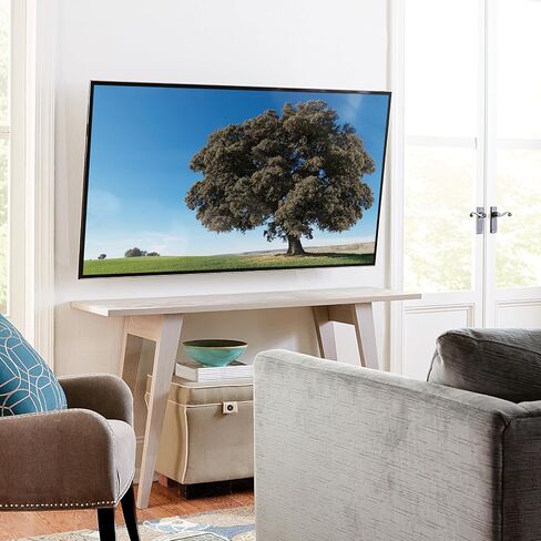 SANUS Tilting TV Wall Mount for 42"–90" TVs up to 130 lbs – Low Profile TV Mount with Smooth, Tool-Free Tilt to Reduce Glare – Fits 16" & 24" Studs, Concrete & Block in Saudi Arabia