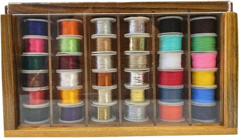 36 Fly Tying Spools of Thread, Floss, Tinsel, Wool, and Wires in a Wooden Box in Saudi Arabia