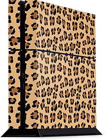 Skinit Decal Gaming Skin Compatible with PS4 Console - Officially Licensed Skinit Originally Designed Leopard Spots Design in Saudi Arabia