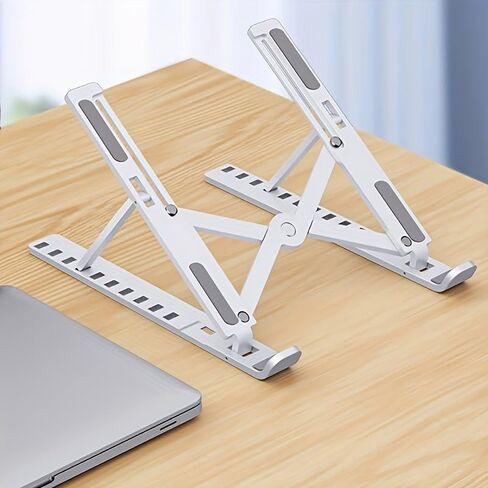 Foldable Laptop Stand Holder Portable Notebook Plastics Support Base Adjustable Riser Cooling Bracket Laptop Accessories in Saudi Arabia