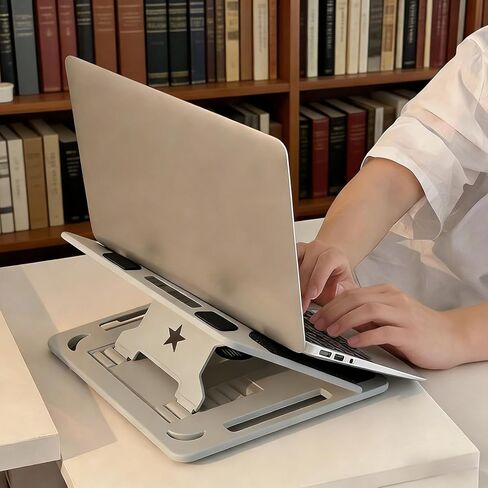 Portable Laptop Stand, Ergonomic & Foldable, Computer Stand 7 Adjustable Angles, 360° Rotating, Cooling Vent Design, Lightweight Laptop Stand for Desk, Office, Travel, Home in Kuwait