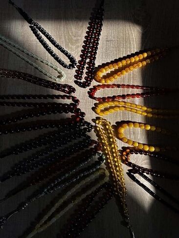Pressed Powder Amber Rosary Round Sphere Moire Vernier Cut Red Colored Metal Tassels in Saudi Arabia
