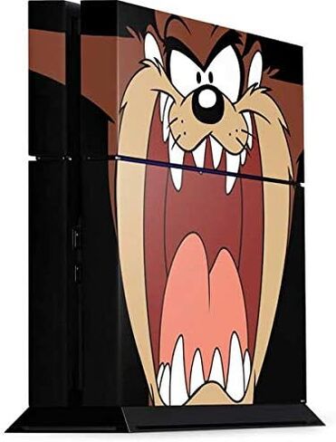 Skinit Decal Gaming Skin for PS4 Console - Officially Licensed Warner Bros Taz Design in Kuwait