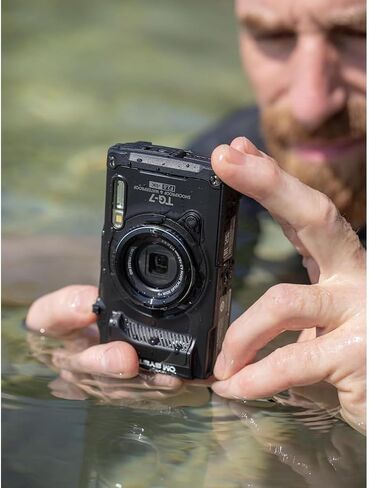 كاميرا رقمية تحت الماء OM SYSTEM Olympus Tough TG‑7 بدقة 12 ميجابكسل 4K، حزمة مغامرات سوداء مع غطاء PT‑059 تحت الماء، حامل رياضي، مجموعة أقلام مصباح يدوي خارجي وبطاقة Lexar 64GB SDXC in Kuwait
