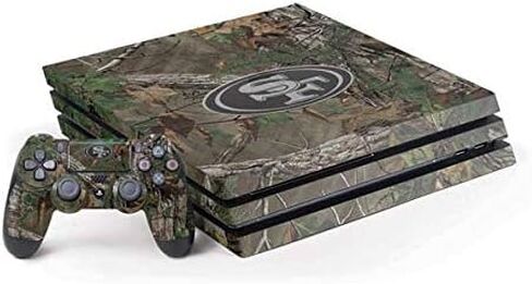 Skinit Decal Gaming Skin Compatible with PS4 Pro Console and Controller Bundle - Officially Licensed NFL San Francisco 49ers Realtree Xtra Green Camo Design in Kuwait