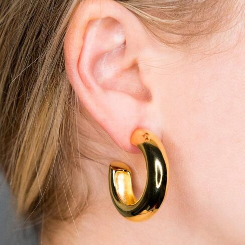 Kenneth Jay Lane Polished Gold Wide Hoop Clip-on Earrings in Saudi Arabia