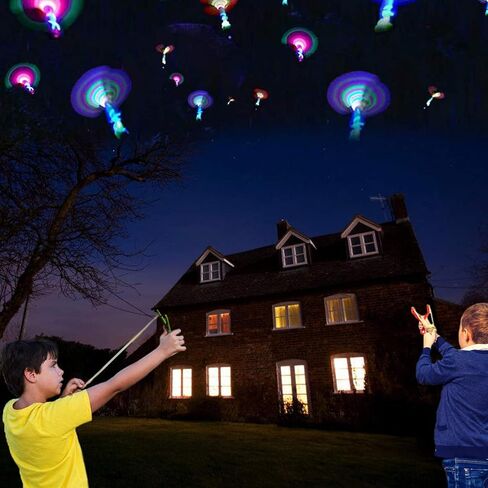 جيه اكس العاب مقلاع صاروخ طائرة مع اضواء LED مع 12 قطعة قاذفة + 12 طائرة هليكوبتر اسهم + 12 قطعة اجنحة اضافية، لعبة الصيف في الهواء الطلق تتوهج في الظلام لوازم حفلات الاطفال in Kuwait