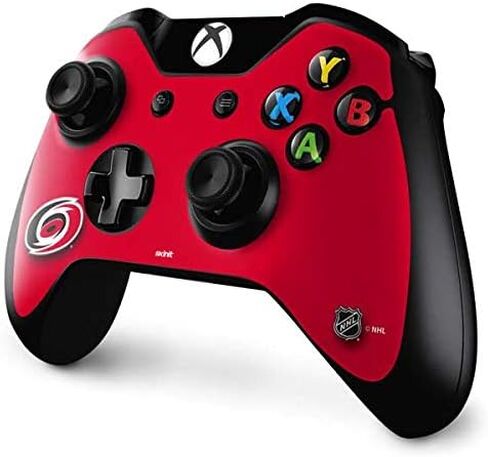 ملصق Skinit المخصص للألعاب متوافق مع وحدة تحكم Xbox One - تصميم خلفية صلبة مرخص رسميًا من NHL Carolina Hurricanes in Kuwait