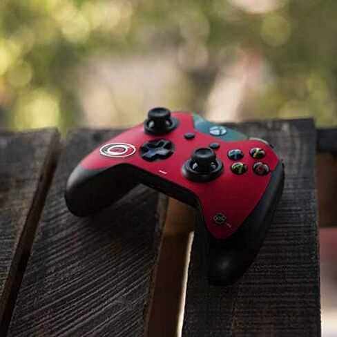 ملصق Skinit المخصص للألعاب متوافق مع وحدة تحكم Xbox One - تصميم خلفية صلبة مرخص رسميًا من NHL Carolina Hurricanes in Kuwait