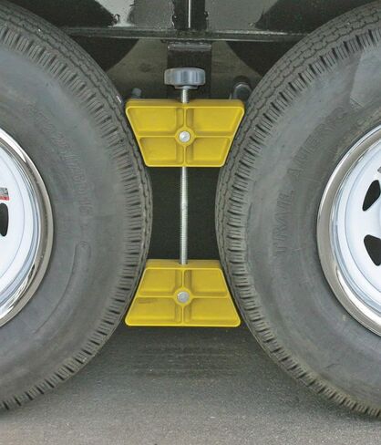 Camco RV Wheel Stop with Padlock- Stabilizes Your Trailer by Securing Tandem Tires to Prevent Movement While Parked- 26" to 30" Tires- Large (44642) in Saudi Arabia