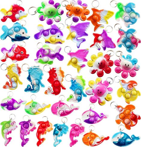 26 Packs Bluk Octopus fishs dolphins turtles sharks whales mini Pop Keychain,Birthday Party Favors Supplies Classroom summer students Prize in Saudi Arabia