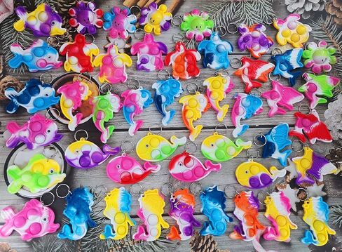 26 Packs Bluk Octopus fishs dolphins turtles sharks whales mini Pop Keychain,Birthday Party Favors Supplies Classroom summer students Prize in Saudi Arabia