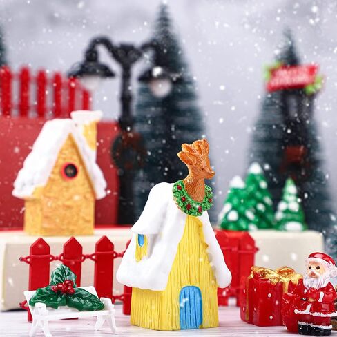 39 Pcs Christmas Village Houses Figurines Decoration Set Christmas Miniature Ornaments Mini Garden Accessories Kit with Santa Claus Snowmen Reindeer Bench Street Lamps Christmas Tree in Saudi Arabia