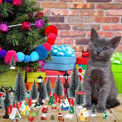 39 Pcs Christmas Village Houses Figurines Decoration Set Christmas Miniature Ornaments Mini Garden Accessories Kit with Santa Claus Snowmen Reindeer Bench Street Lamps Christmas Tree in Saudi Arabia