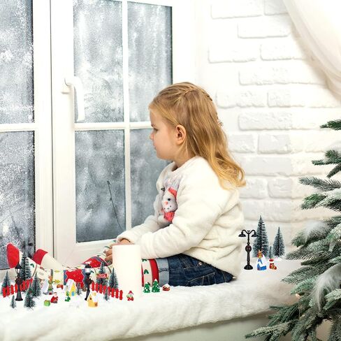 39 Pcs Christmas Village Houses Figurines Decoration Set Christmas Miniature Ornaments Mini Garden Accessories Kit with Santa Claus Snowmen Reindeer Bench Street Lamps Christmas Tree in Saudi Arabia