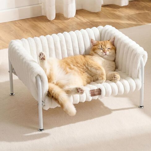 FUKUMARU Elevated Cat Couch Beds for Indoor Cats, Sturdy Metal Frame Cat Hammock Bed with High-Density Foam Cushion, Removable Washable Fluffy Cover, Breathable Raised Dog Bed & Cat Sofa Chair, Cream in Kuwait