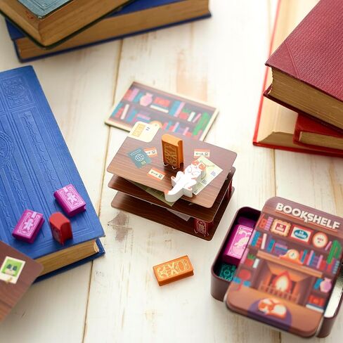 رف الكتب من Alley Cat Games | الأعمار 8+ | 2-4 لاعبين | لعبة التراص التعاوني | لعبة بطاقة المهارة والتوازن وبرج الكتاب في علبة السفر | تحدي الطاولة التعاونية in Kuwait