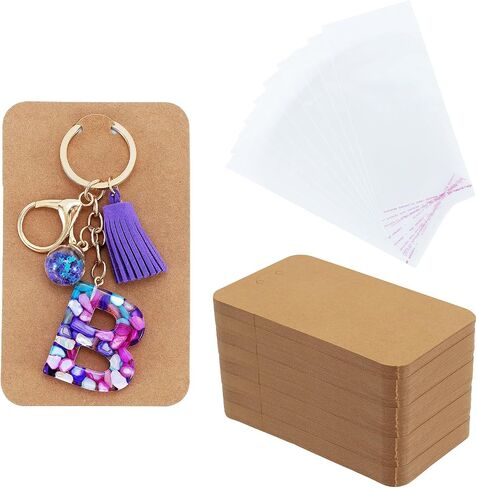 Keychain Display Cards with Self-Sealing Bags, 100 PCS 3'' x 4.7'' Keychain Holder for Display Keyring Jewelry Packaging Supplies (Black) in Saudi Arabia