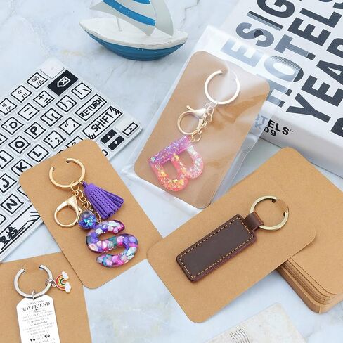 Keychain Display Cards with Self-Sealing Bags, 100 PCS 3'' x 4.7'' Keychain Holder for Display Keyring Jewelry Packaging Supplies (Black) in Saudi Arabia