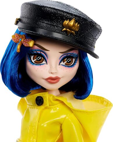 Monster High Skullector Doll, Coraline Collectible in Yellow Raincoat with Dress and Accessories Like Rag Doll, Cat Figure, and Doll Stand in Kuwait