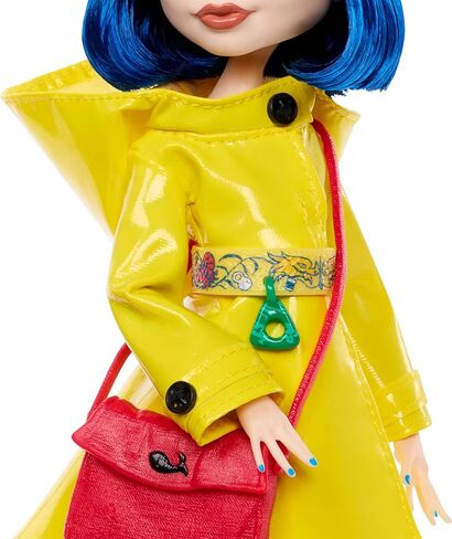 Monster High Skullector Doll, Coraline Collectible in Yellow Raincoat with Dress and Accessories Like Rag Doll, Cat Figure, and Doll Stand in Kuwait
