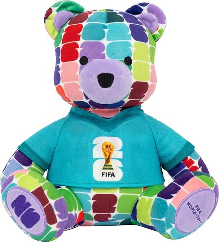 دب ملون من القطيفة مقاس 10 بوصات لكأس العالم FIFA 2026 من Jazwares - يمكن تجميع كأس العالم 2026 رسميًا مع تي شيرت بشعار كأس FIFA - للأعمار من 3 سنوات فما فوق in Kuwait