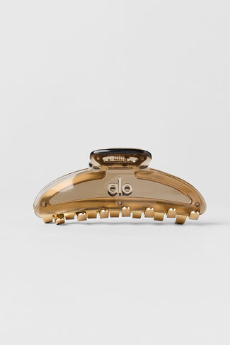 Alo Yoga Acrylic Illusion Claw Clip - Gravel/Brushed Gold - Gravel/Brushed Gold / One Size in Kuwait