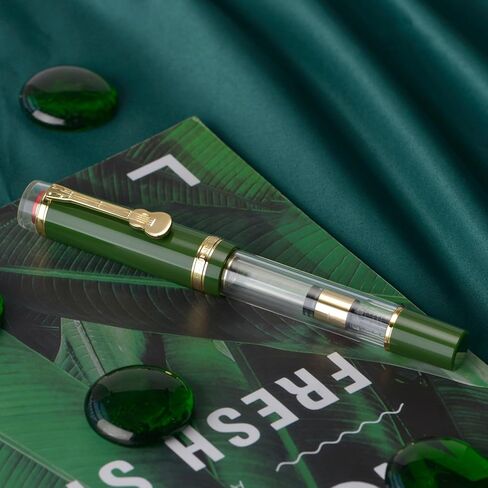 قلم حبر من سلسلة Jinhao 1935 Tiandao، مقاس 8 متوسط ​​اللون أخضر عسكري وأكريليك شفاف مع مشبك جيتار ومحول ذو سعة كبيرة in Kuwait