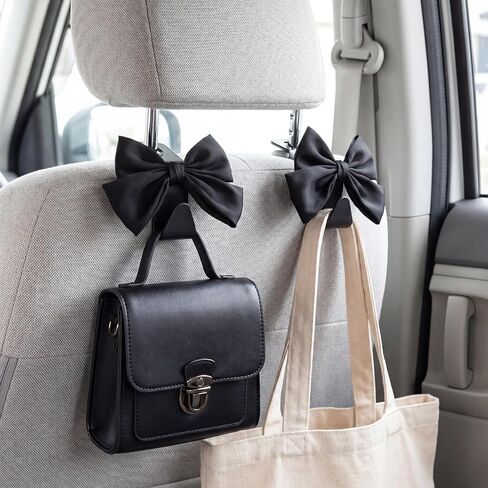 2Pcs Bow Car Headrest Hooks, Durable PVC Seat Back Organizer Hooks, Car Interior Decor Accessories, Multi‑Use for Bags and Umbrella, Universal for Cars, SUV, Truck (Black) in Saudi Arabia