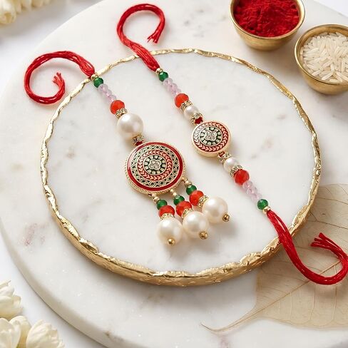 TIED RIBBONS Rakhi for Brother and Bhabhi | Rakhi Set for Bhai Bhabhi Rakhi | Mini Greeting Card | Roli Tikka - Raksha bandhan | Lumba Rakhi for Bhabhi Rakhi for Bhaiya Bhabhi with Gift in Saudi Arabia