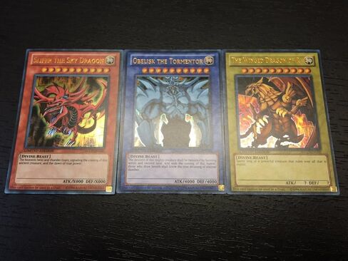 YUGIOH: Obelisk SLIFER RA - لعبة HOLO NM النادرة جدًا - بطاقات الإله المصرية - مجموعة YGLD in Kuwait