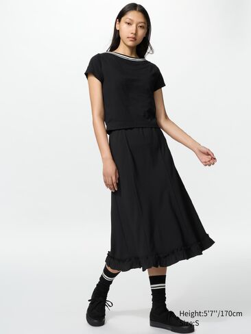 Uniqlo تنورة طويلة مضيئة in Kuwait