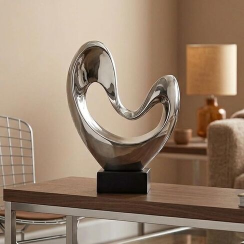 Deco 79 Polystone Abstract Decorative Sculpture Heart Home Decor Statue with Black Base, Accent Figurine 10" x 5" x 14", Silver in Saudi Arabia